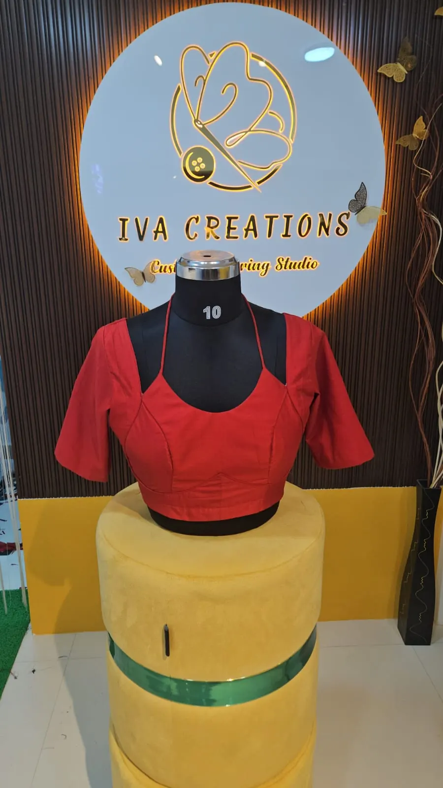 Red halter-neck blouse with princess seams