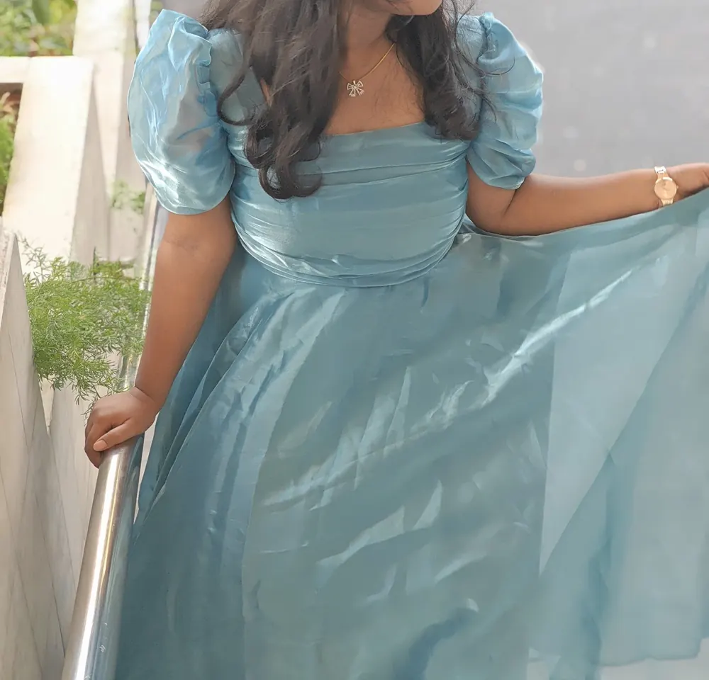 Powder blue organza gown with puff sleeves